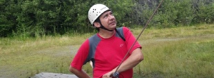 Belaying a rock climber Lake District